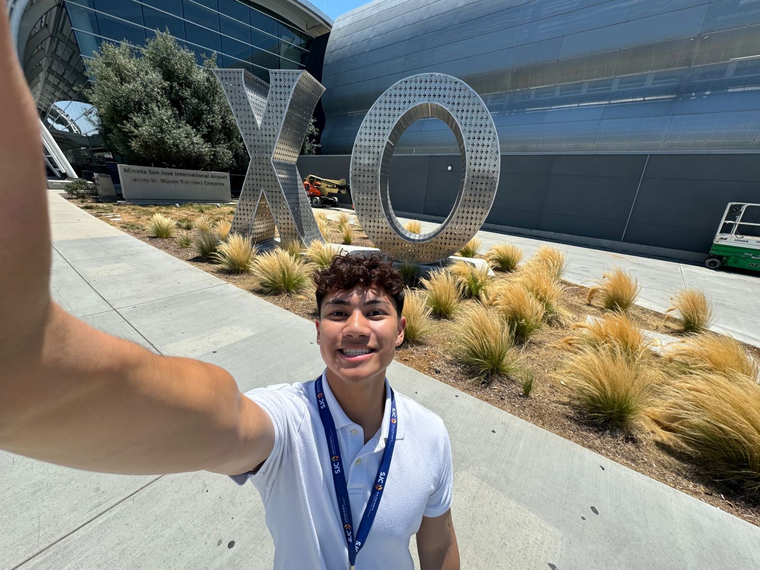 Jaime in front of XO sign